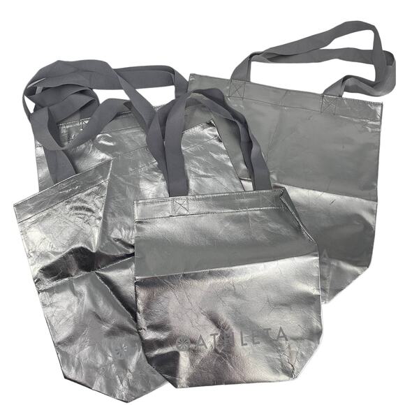 Athleta Metallic Silver Reusable foldable Shopping Tote Bag Gray Handle - Picture 1 of 3